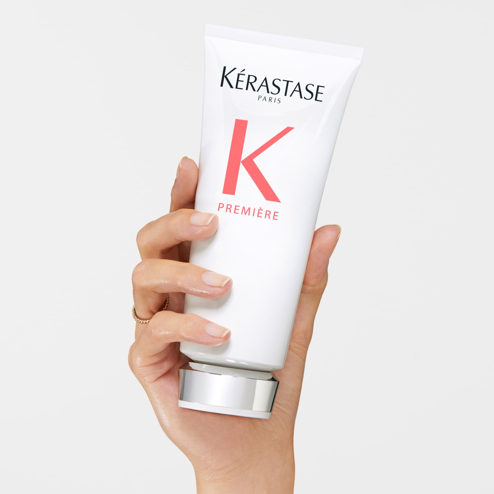 Tratamento para cabelos danificados e quebradiços com Kérastase Première Fondant Fluidité Réparateur